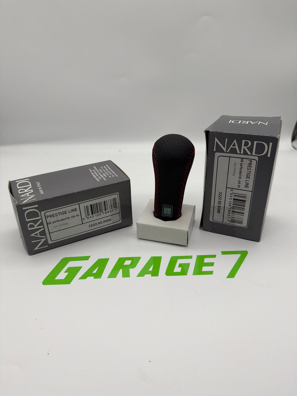 Nardi Prestige Line Leather - Gear shift knob in black perforated leather & black smooth leather with red cross stitching (custom colors available
